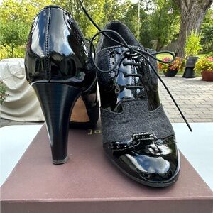 Black Patent leather and fabric  lace up Jon Josef booties. Size 7 Heel 3 inche